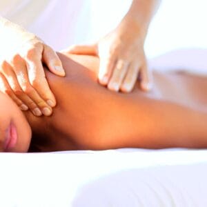 A woman getting her back touched by someone else